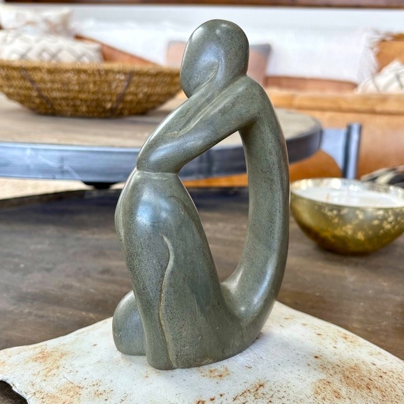 Gray Abstract Stone Sculpture with Fluid Curves - Picture 1 of 11